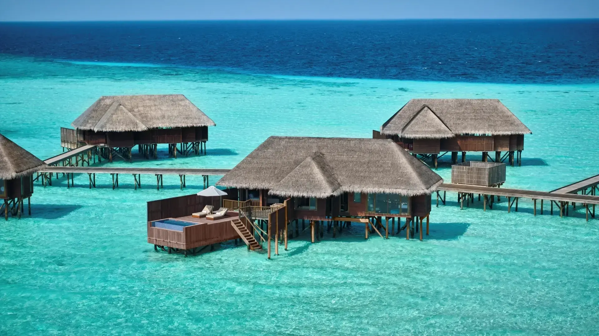 Overwater villas at a private island resort